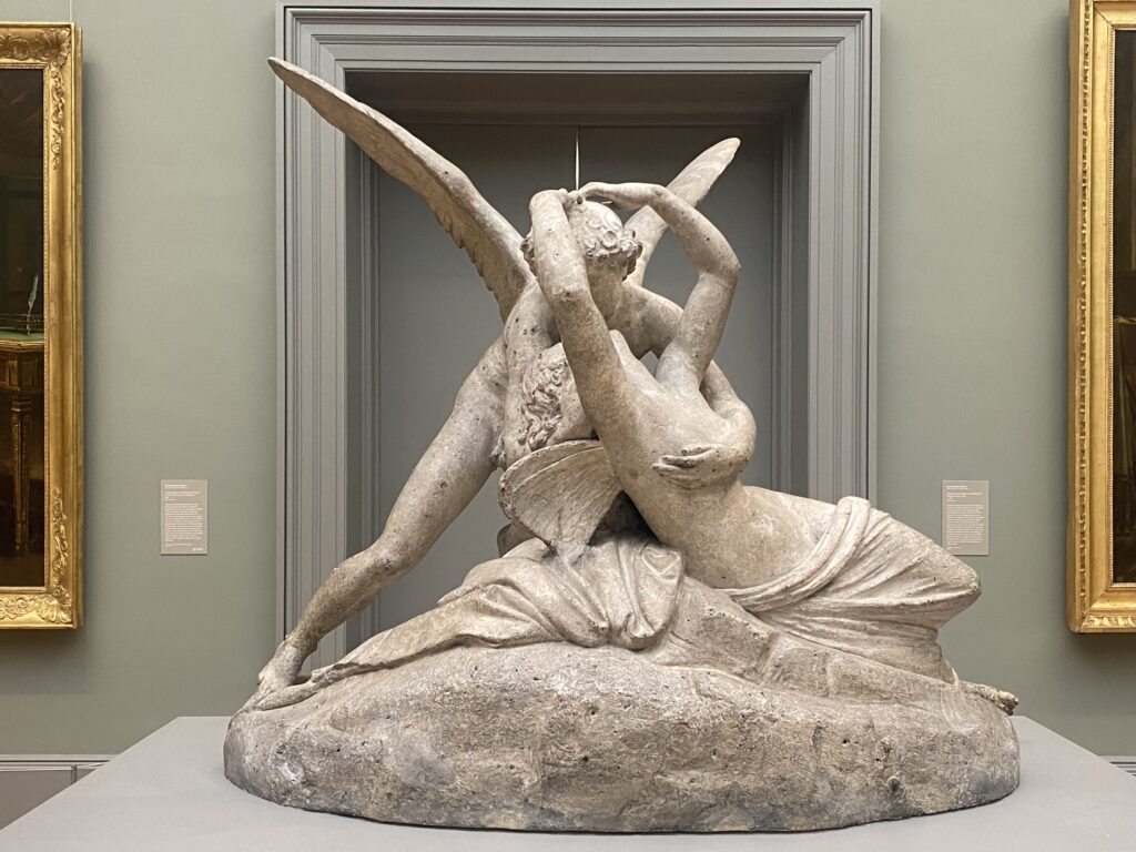 Statue at the Metropolitan Museum of Art (MET) of two people embracing in relative nudity-used to symbolize the sophisticated lifestyle of the it girl